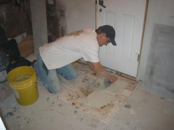 my fellow tilesetter, Chris, in motion, i follow with hardie screws 1 and 1/4 in length.