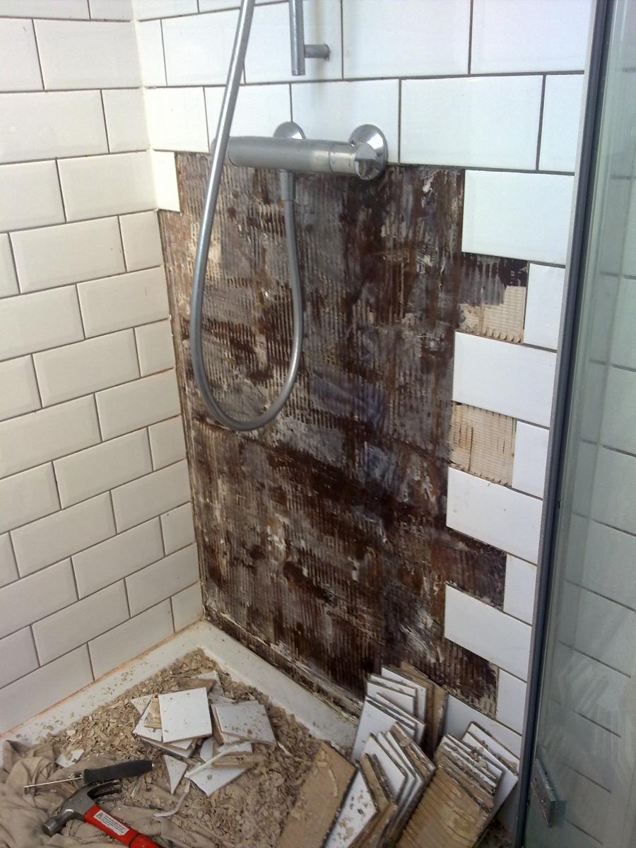 My tiling ruined by a plumber who didn't bother to tighten the shower connections so the water leaked diwn the back of the tiles. I had to chop them off, let it all dry for 2 weeks, then tile into the gap, you'd never know I had to do it looking at it now!