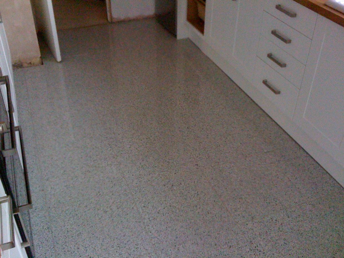 Polished porcelain grey fleck tiles with Weber fine flex grey grout