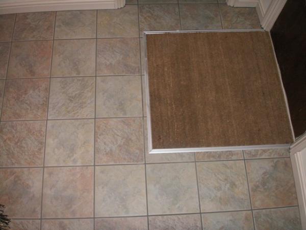 Porcelain with cut in door mat