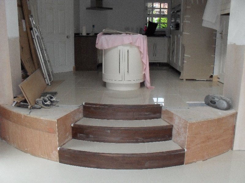 Raised kitchen area, curved steps down to extension thru to utility area
50 sq mtr Floor
B&Q 60x60
Polished Porcelain