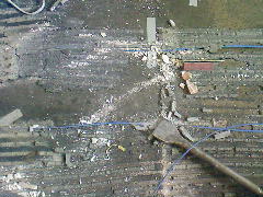 Ripping up the floor, note the gap between the UFH wires.......its 160mm!