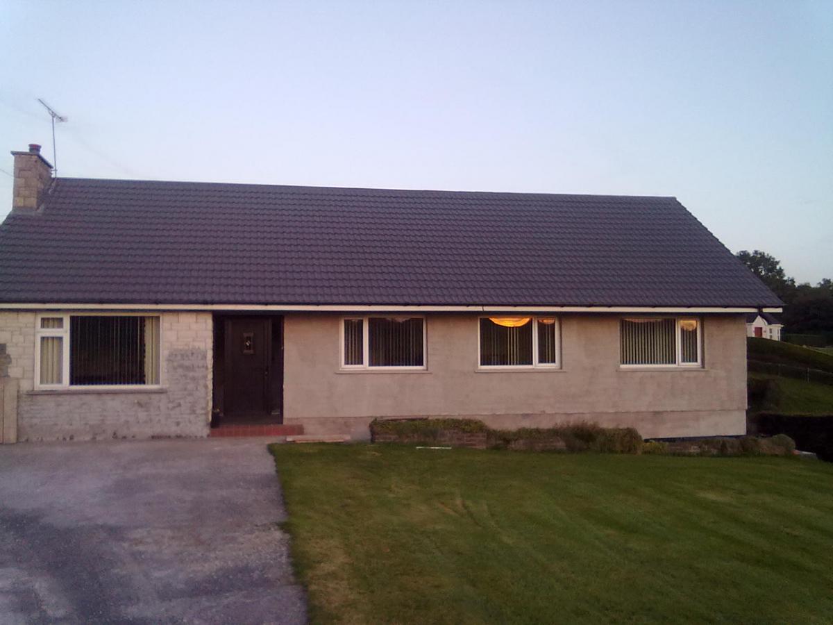 Roof after second coat of roof paint, new front door