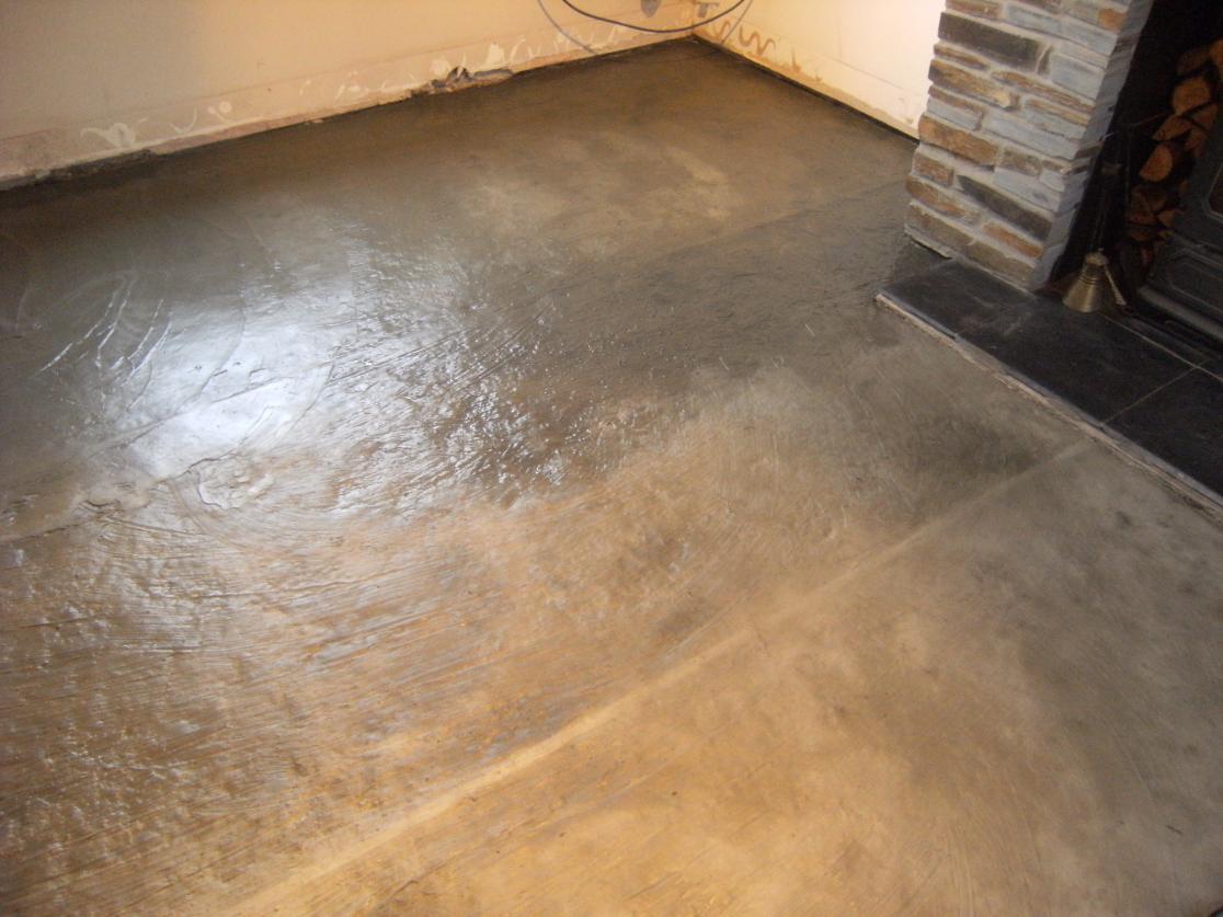 screeded floor was covered in an sbr and cement mix to bind it back togeather