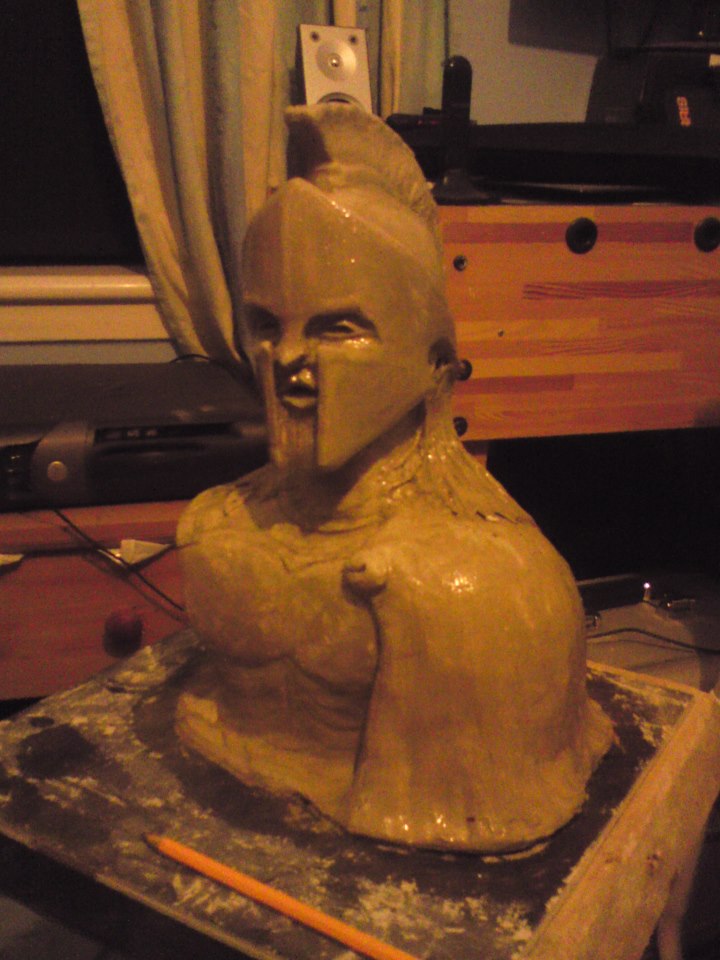 sealing the clay with shellac flakes and clear varnish mixture and firming the base with modelling clay  step 5