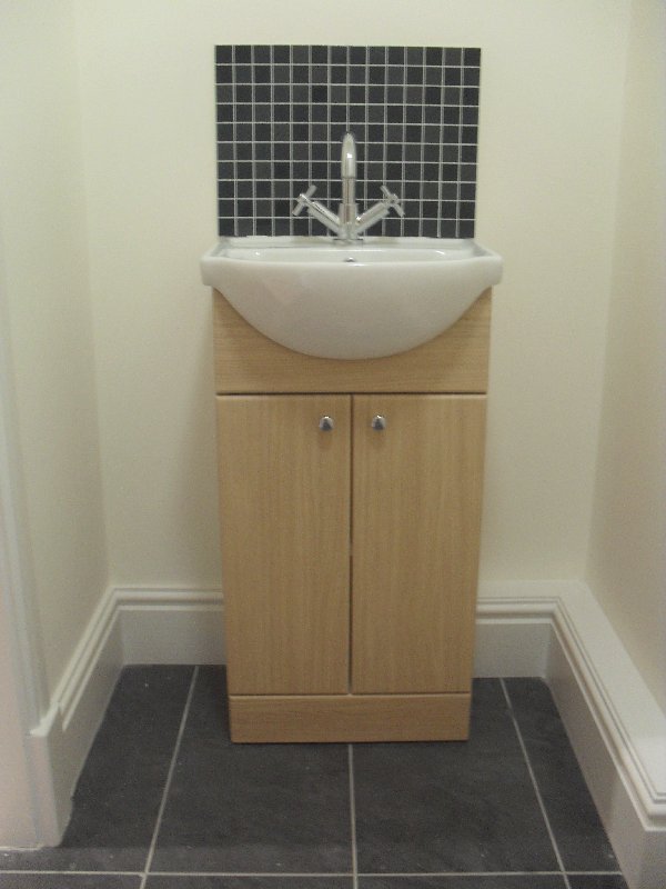 Small toilet area 
Porcelain floor & ceramic splashback