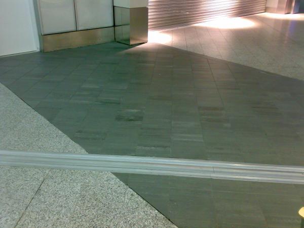 stansted airport floor tiling