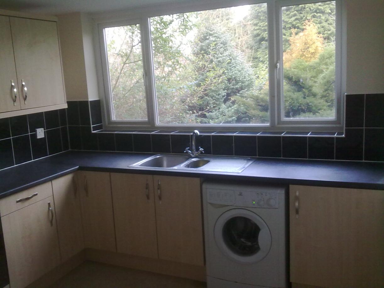 student house kitchen tiled grouted and lick of paint