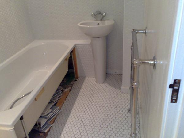 Teddington - tiled bathrooom walls and floor using 1x1 octogan mosaic tiles