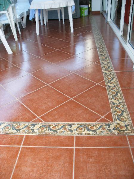 Terrace tiling with inlay & border