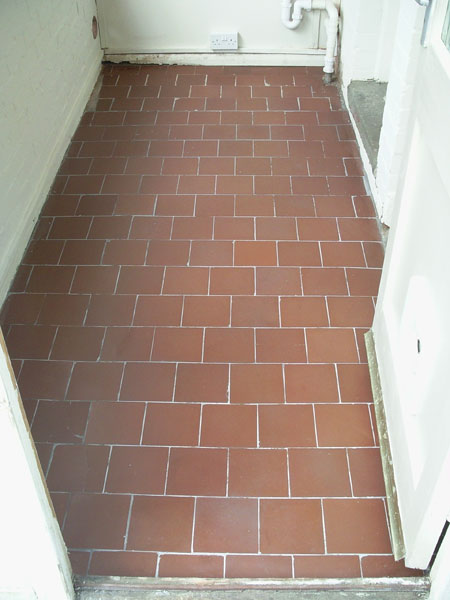 The quarry tiles cleaned, sealed, regrouted and sealed again.  They were quite rough to star with (see earlier pictures) and we did our best with them.