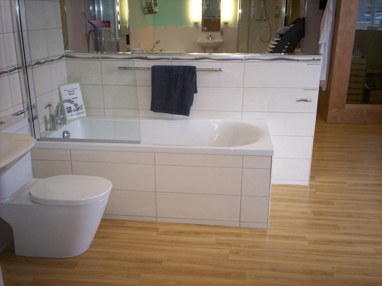 This bath sits in a kind of polysterene base that you can tile straight to,was very strange to use.