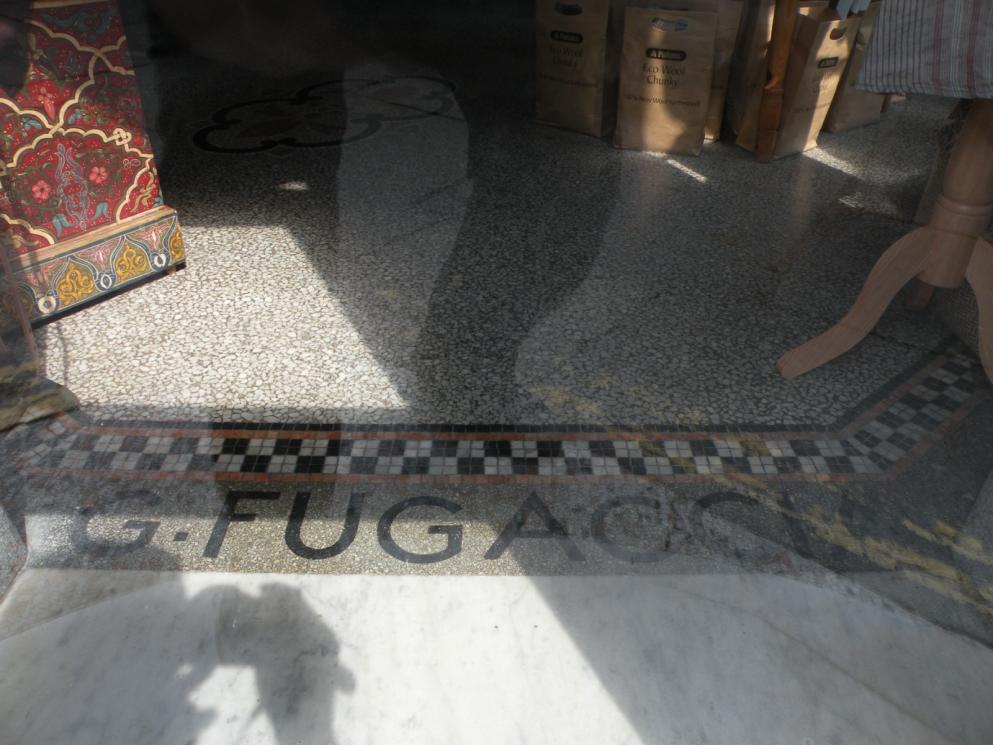 This shop is across the road from the other photo. It was a former Italian Ice Cream parlour. The shop was closed when I took the photo, but it has the most incredible floor made up of a insitu terazzo and mosaic.
I will get a snap of the signage of the same shop which, incredibly, I only noticed yesterday!!