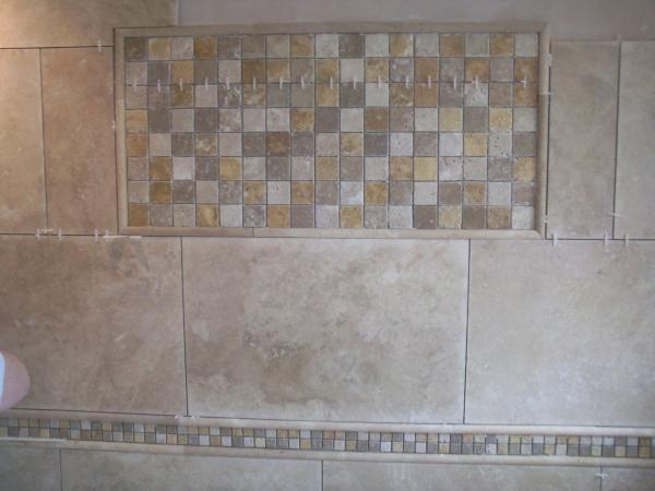 trav bathroom wall, with border and mossiac bordered rectangle